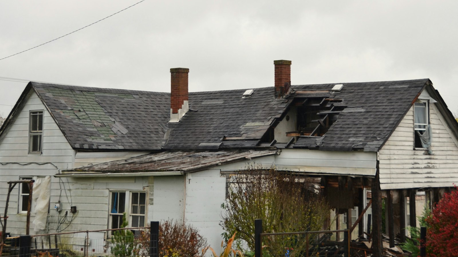 House with storm-damaged roof